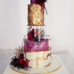 tort weselny biało-różowo-złoty z separatorem